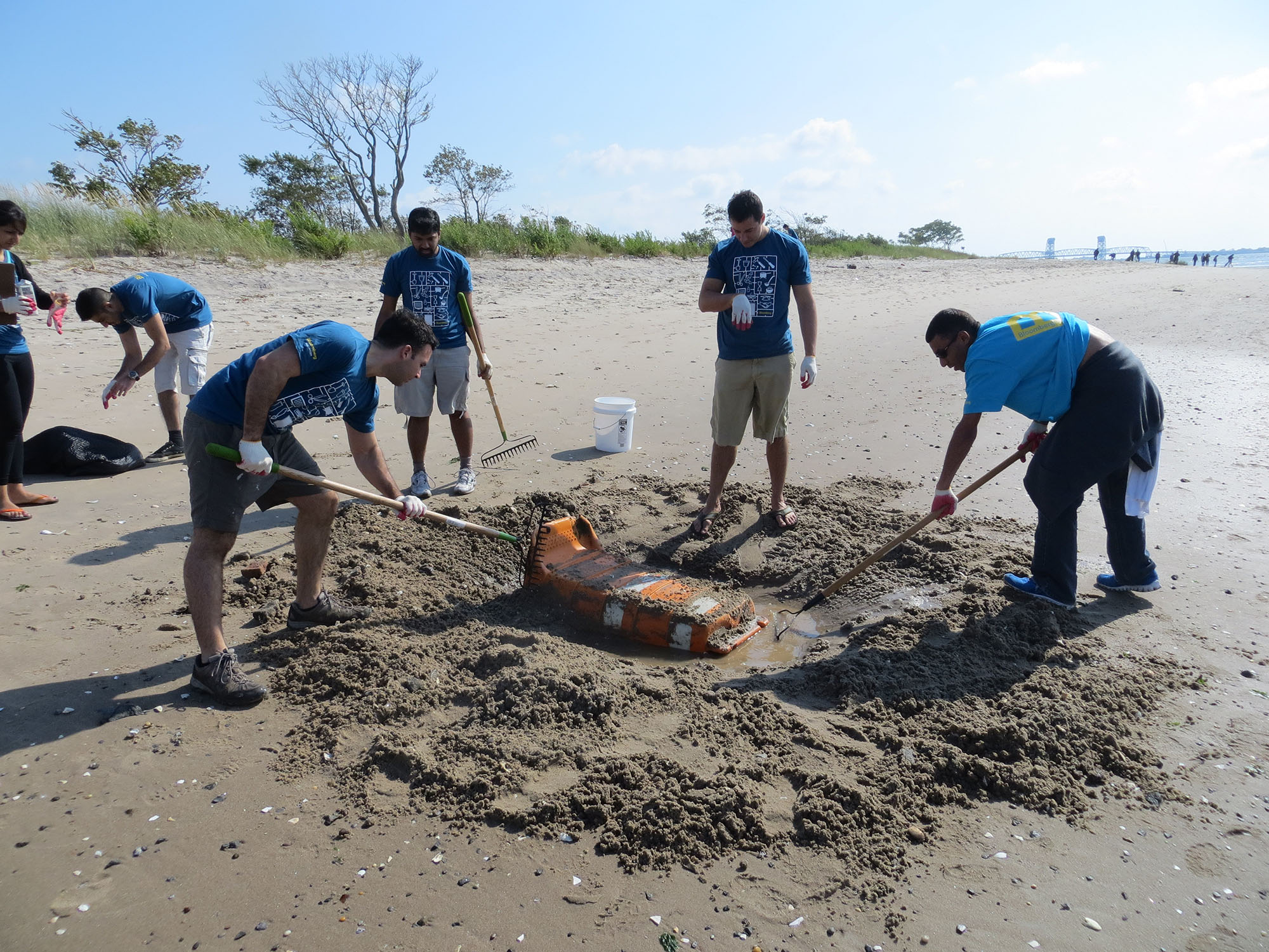  Volunteers remove 450 lbs of large-scale debris from Plumb Beach. 