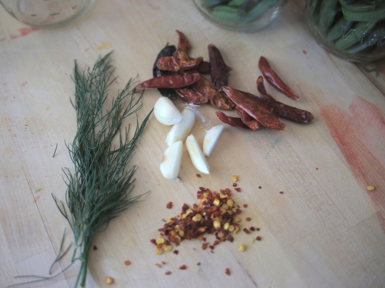 Ingredients for our seasoning; dill, peppers, garlic, red pepper flakes.