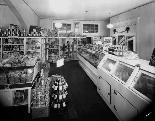 The Farmhouse's previous life as a convenience store circa 1931. The walk-in cooler that now serves as the mushroom incubator can be seen above in the rear right-hand side behind the counters. Photo provided by Martin Gordon