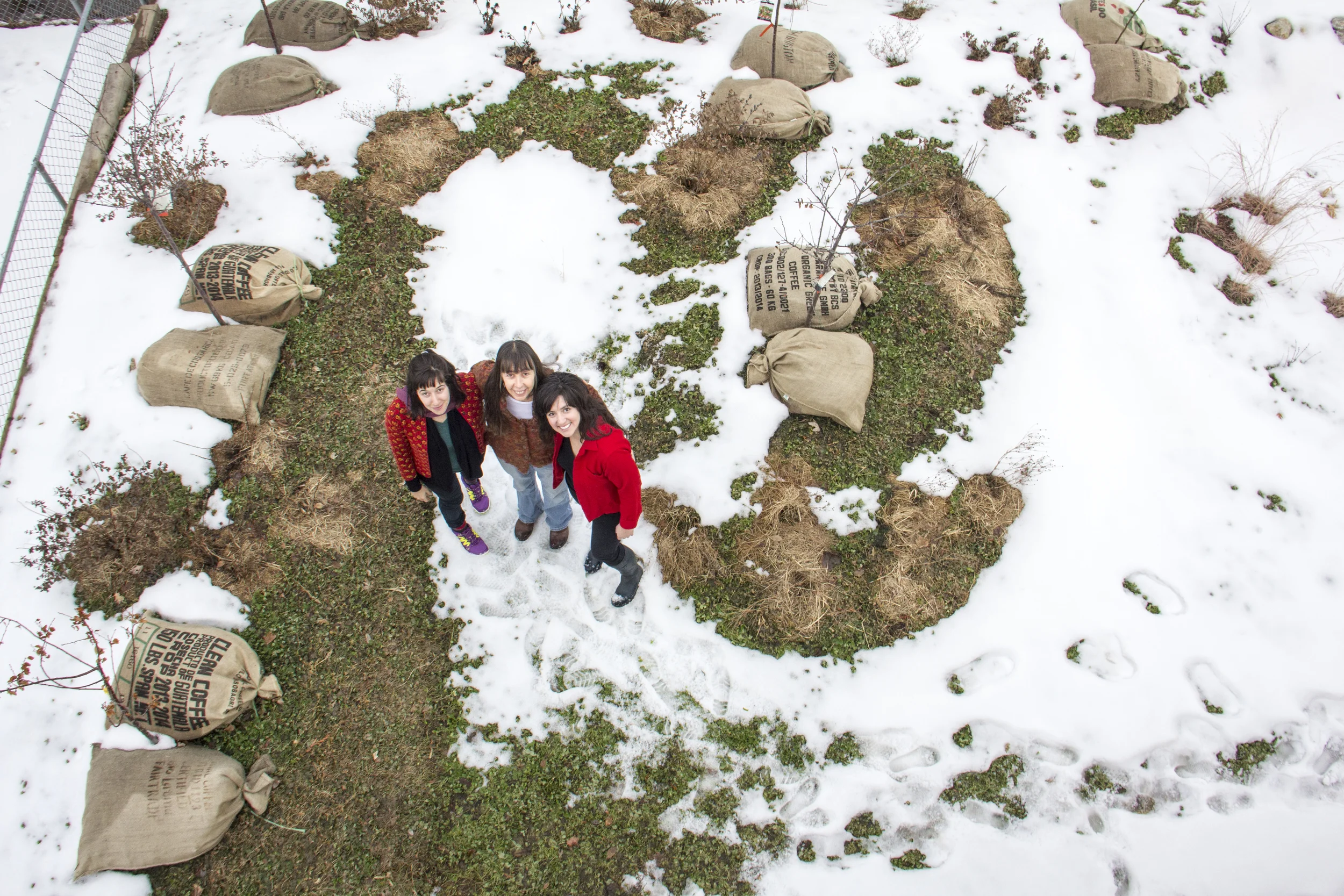 The designers standing proud in a landscape they created at the Tiny Diner Restaurant in South Minneapolis.