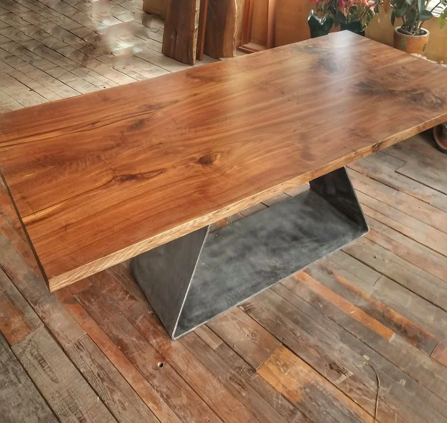 DARK WALNUT BOOKMATCH w/ ARROWGLASS BASE TABLE 96”x 44.5” $6000.00 ($5300.00 w/ standard base)