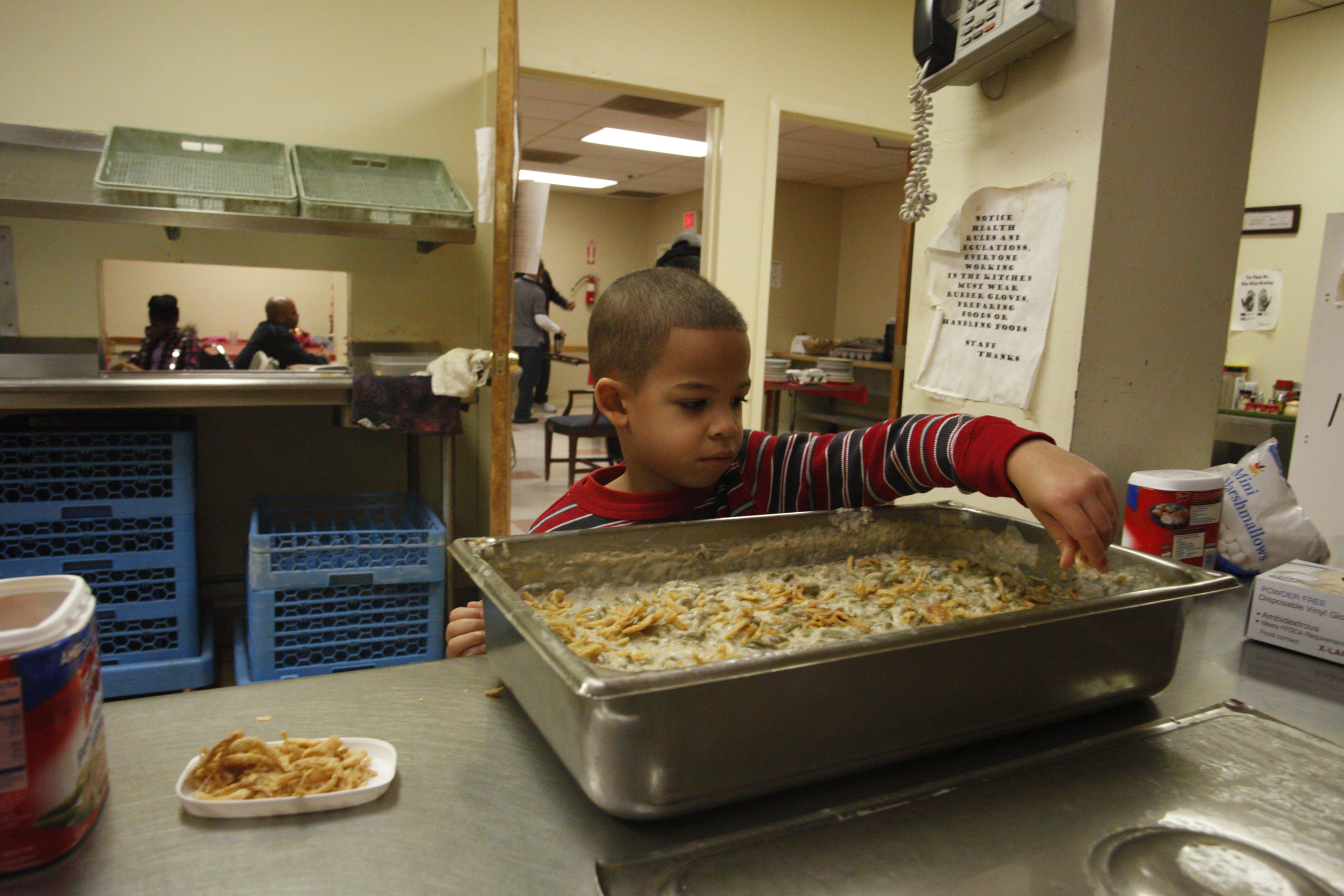  Every year the New Castle Jaycees Cook a Thanksgiving meal for the residents of Sojourners' house, a homeless shelter in Wilmington, Delaware on November 28, 2013 