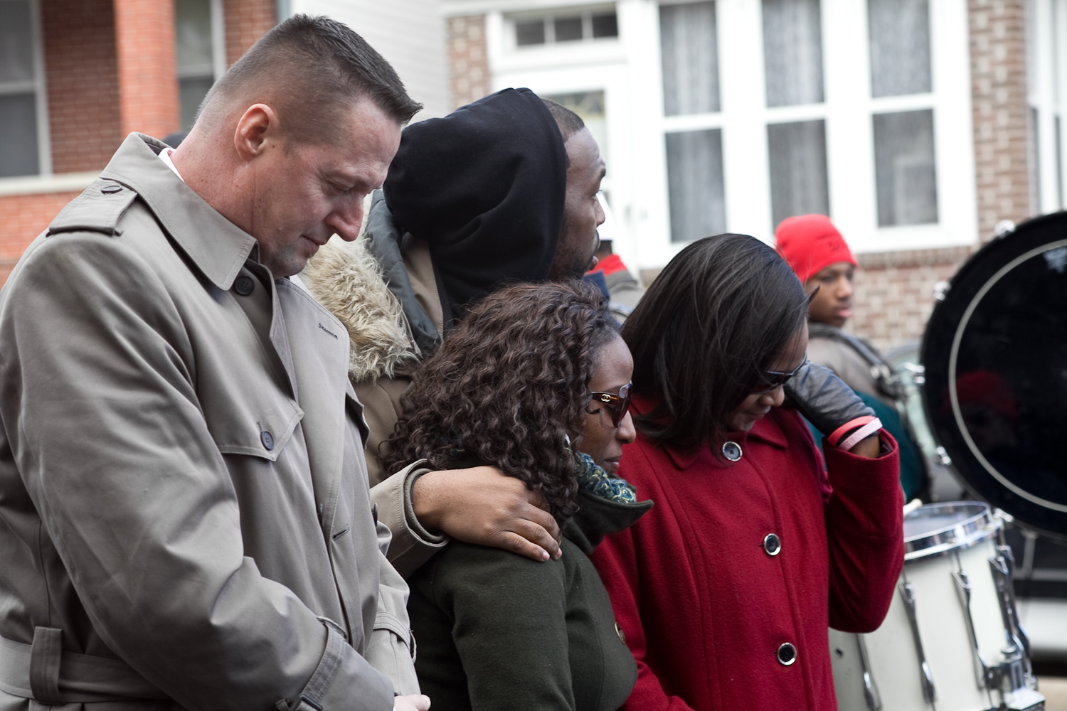 Wilmington City Council Member, Robert Williams(D), Stands with the marchers in prayer, at the Martin Luther King Jr. Day march in Wilmington, Delaware on January 19, 2015
