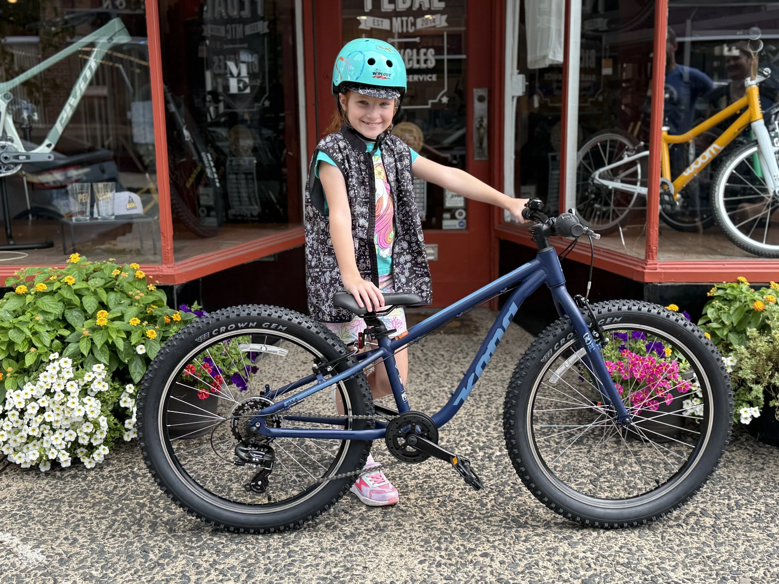 Kona bikes for kids, boys, girls, happy