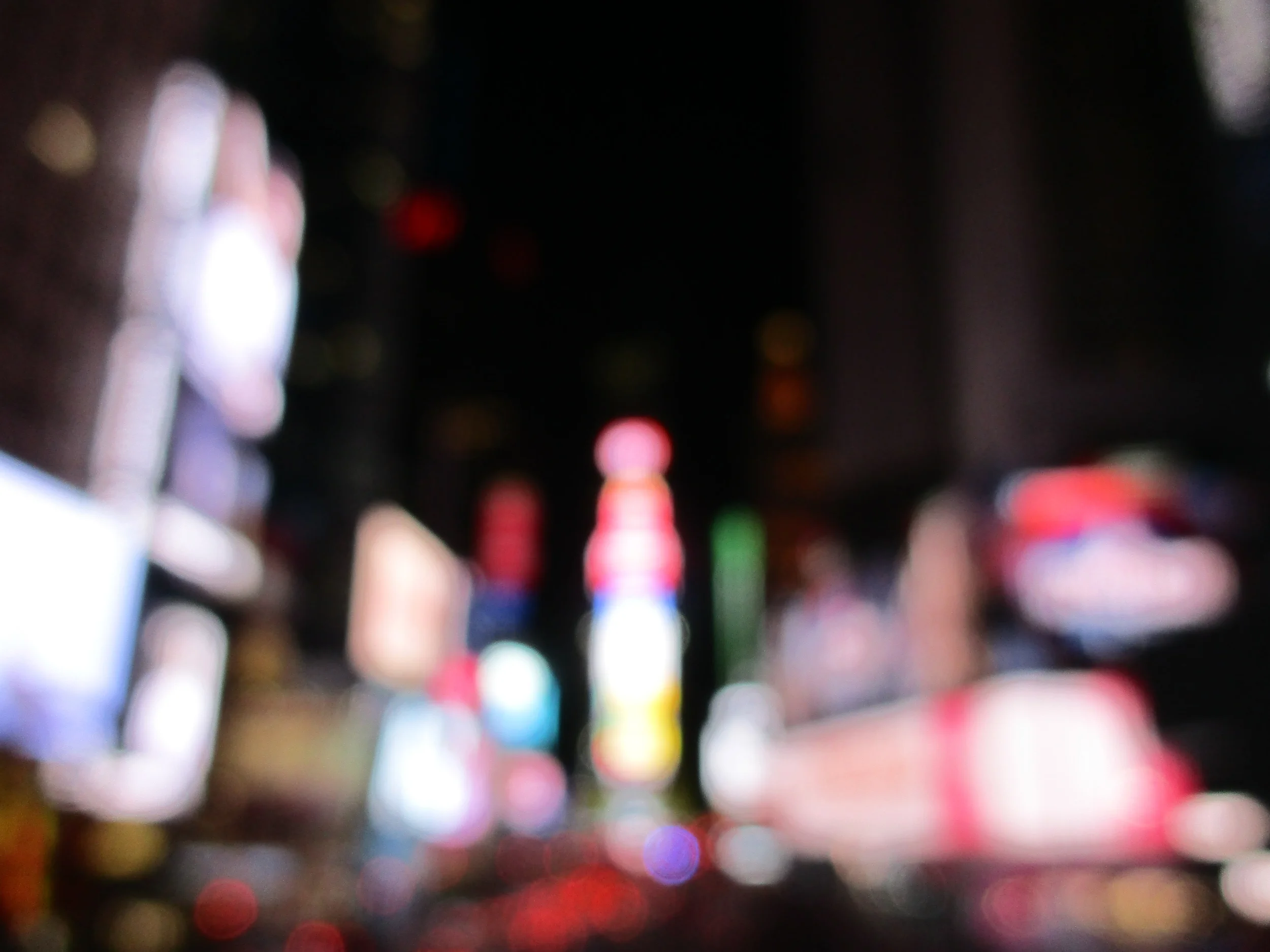 I got a new camera and couldn't focus it but happy accidents on our first night in NYC include this photo and cocktails in Ellen's Stardust Diner.