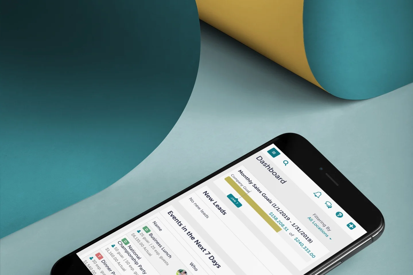 mockup-of-an-iphone-8-lying-over-a-big-piece-of-bent-paper-a20464+%281%29.jpg