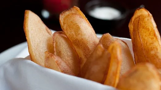 Basket of Soufflé Potato Crisps