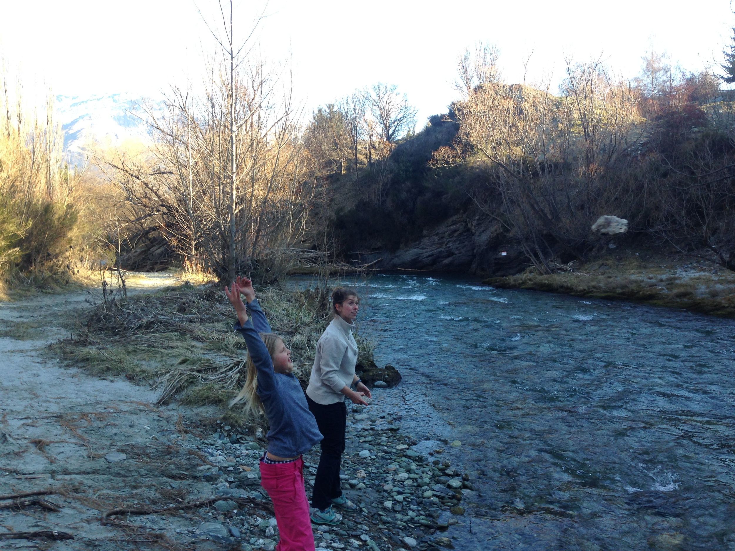 Anna (34) entertaining Anna (9) with a game called "throw rocks, make a big splash".