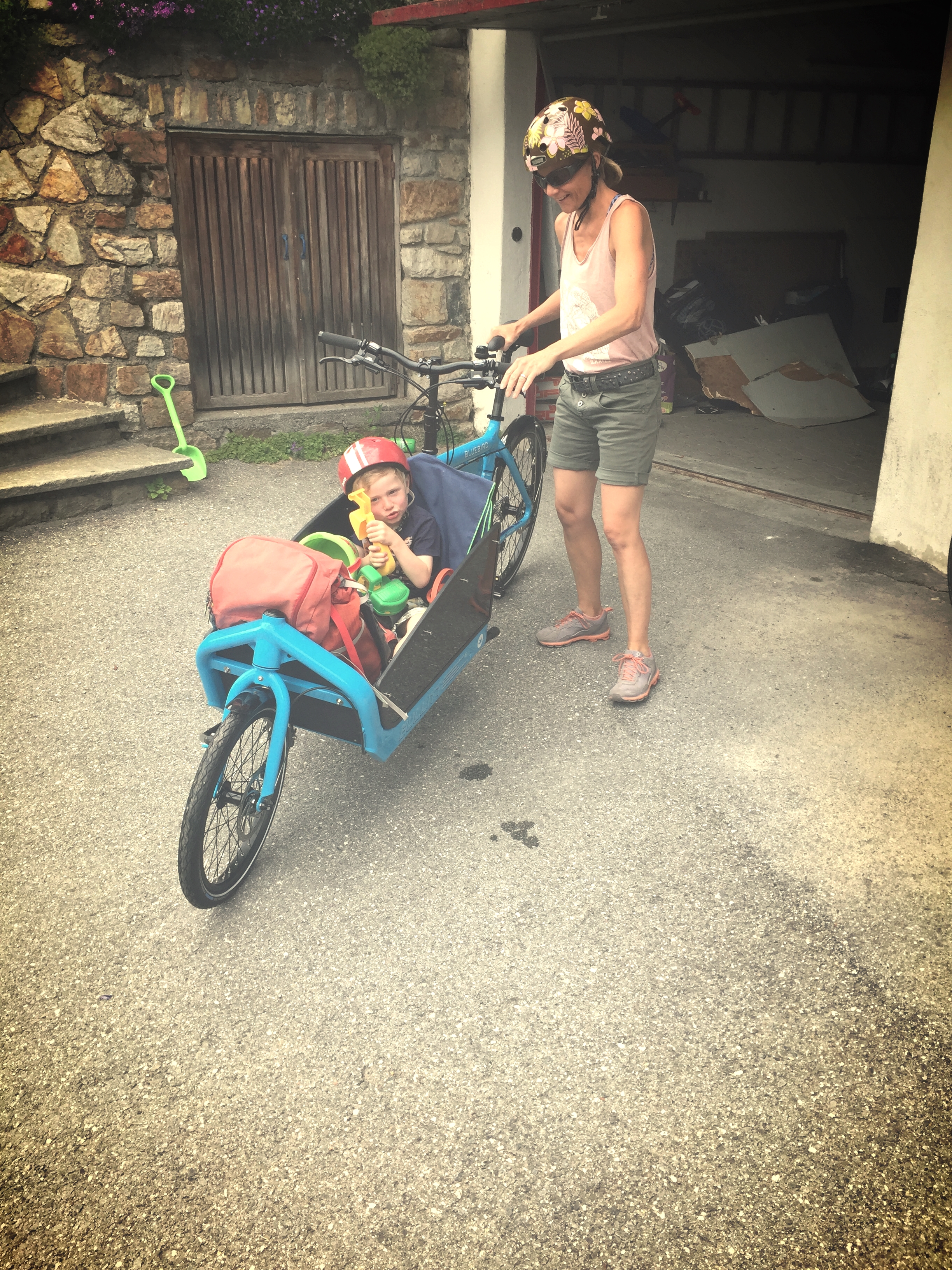 Mama Barbara taking Maurin out for a spin in Blue Bird. Cool cargo bike!