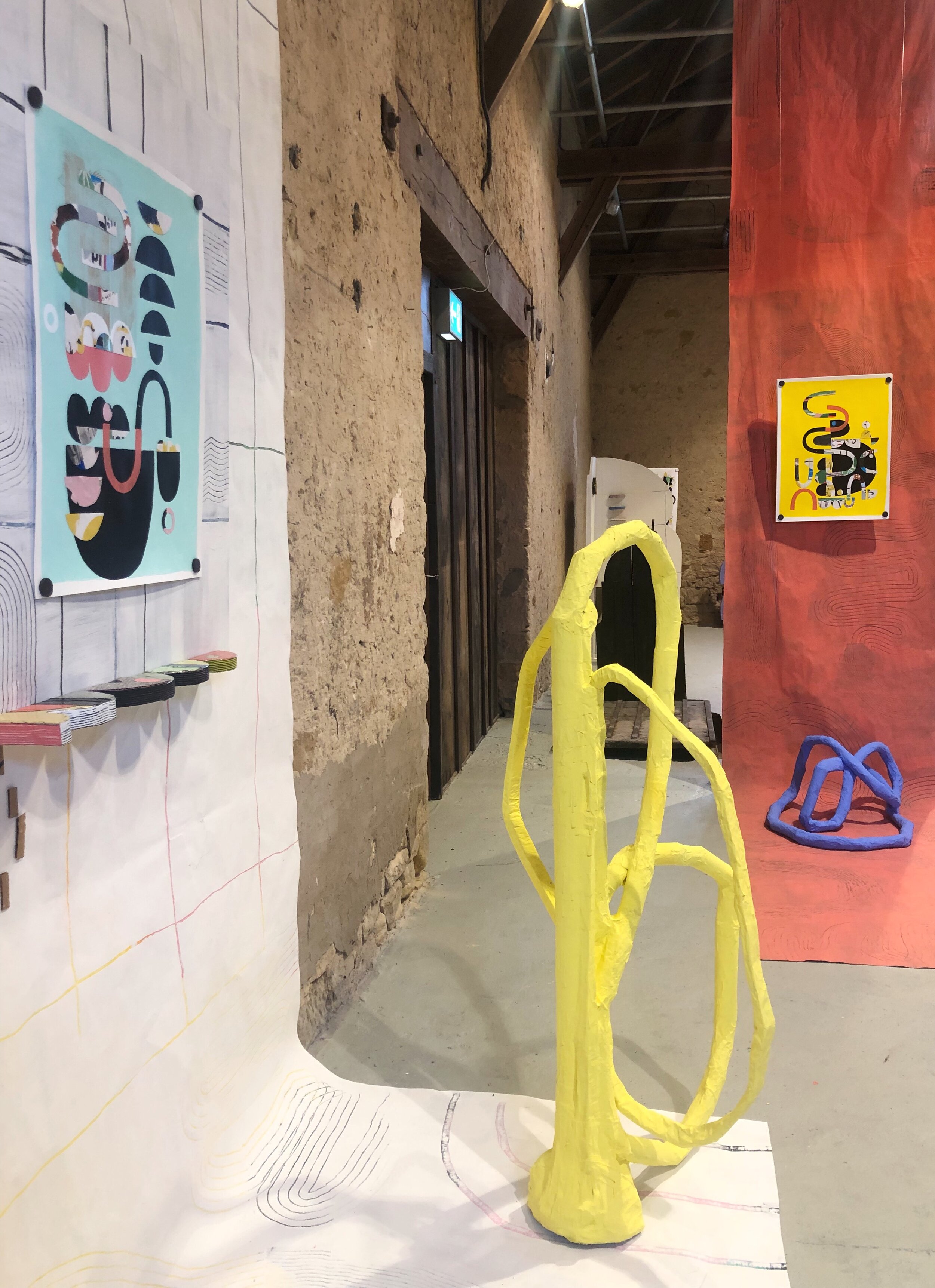  (Center)  Yellow As The Dandelions,  2020, paper, cardboard, paper machė, plaster, metal, wood, house paint, dimensions variable  (Top Right)   Imagining the Bones and the Creatures They Come from,&nbsp; 2019, Collage, acrylic, flashe vinyl, serigra
