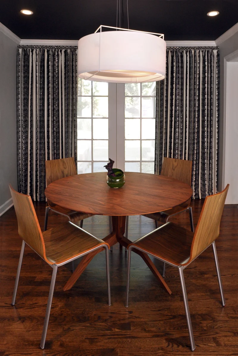 This 1970’s Colonial was completely devoid of personality when the current owners, a Manhattan-transplant couple, moved in. Its selling point was the home’s gracious layout and generously proportioned rooms. Tapping into our eclectic aesthetic and robust knowledge of design, we developed a thoughtful space plan full of iconic and new-modern pieces. Smart tailoring and fashion-inspired textiles work seamlessly together to create an elegant but welcoming environment fit for chic entertaining and everyday use. What we did: NMI assisted the clients in changing out wall coverings, floor tile, millwork, custom fireplace surround designs, and bathroom renovations. We developed space plans for a new master bathroom and bedroom suite and specified furnishings, artwork, and accessories for the common rooms of the home. 