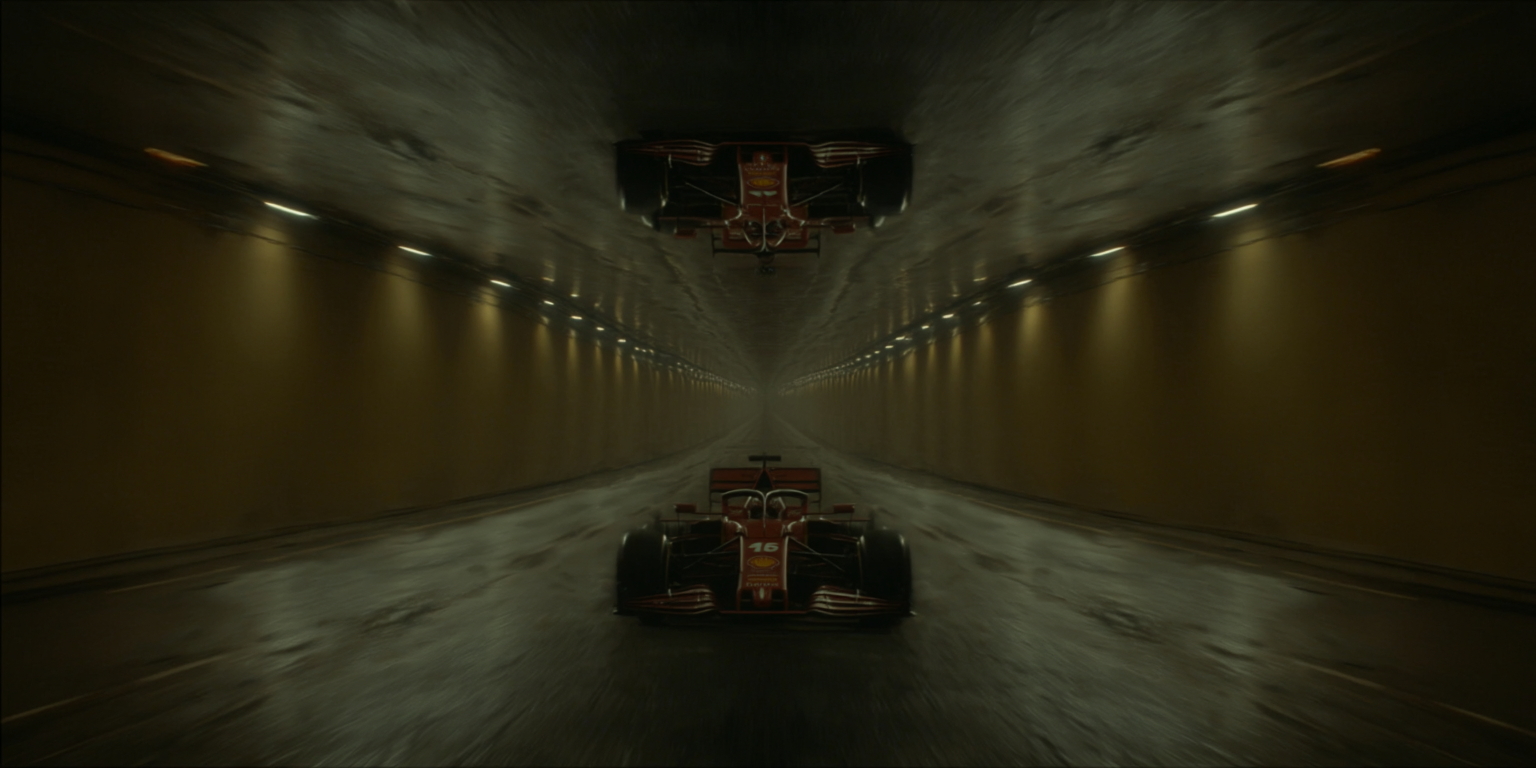 u1146626773_Formula_1_car_race_at_full_throttle_through_a_lon_79a8375d-f7d5-4318-84cf-9271636b8551_1.png