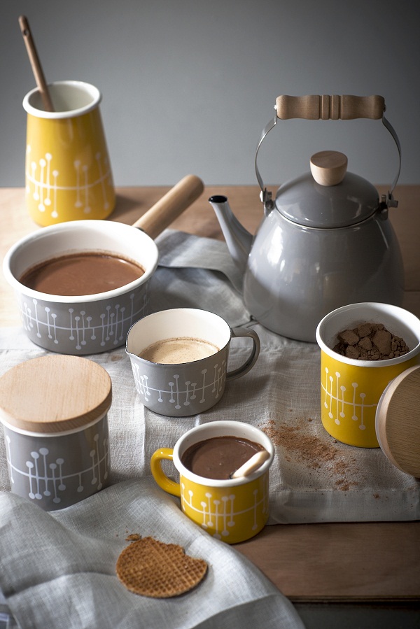 Enamel Muscat patterned mugs, £12.50 each, enamel stove kettle, £30, milk saucepan, £25, canisters £16.50, utensil holder, £14.50 and milk jug, £12.50.