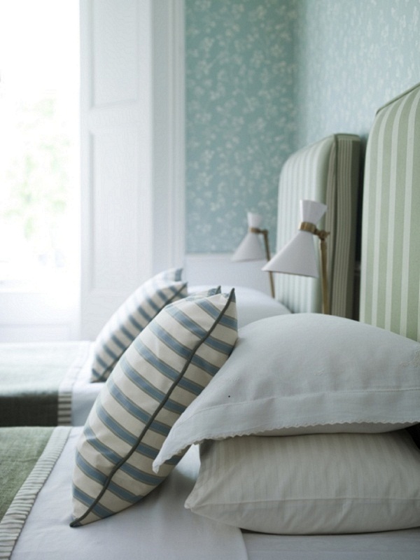 Ian Mankin - Green guest bedroom detail - Imperial Collection - Wallcovering Kew Mint - Headboards in Oxford Stripe Sage - lifestyle - Portrait.jpg