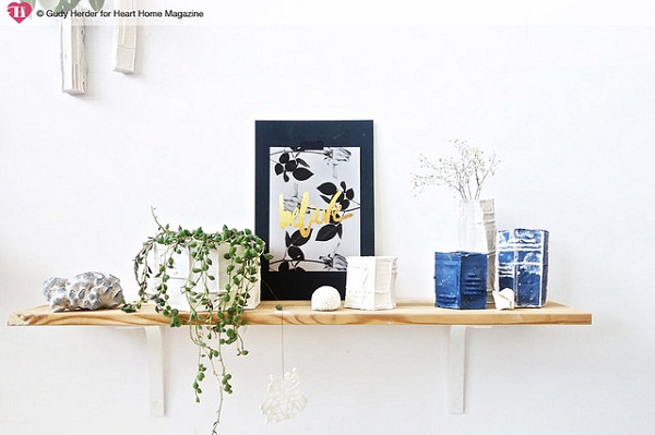 A shelf in Gudy’s workshop is immaculately styled, and is home to a beautiful collection of her ceramics.