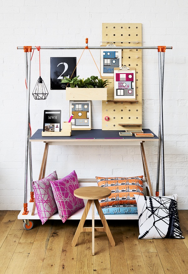 Industrial Clothes Rail, £695, Inspirit Deco. Stool in oak, £150, ByALEX.