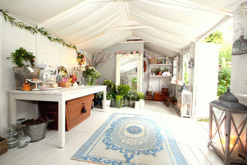 The Bridal Shed. Photography by Anne Wells, p59 – “The underside of the roof is swathed in a cotton canopy. (There is a timber roof above.) A storage area to the far end is created with a stud partition that comes out just to the center of the shed.”