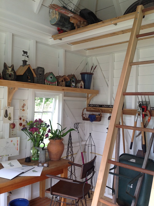 A moveable ladder provides easy access to the loft storage area.