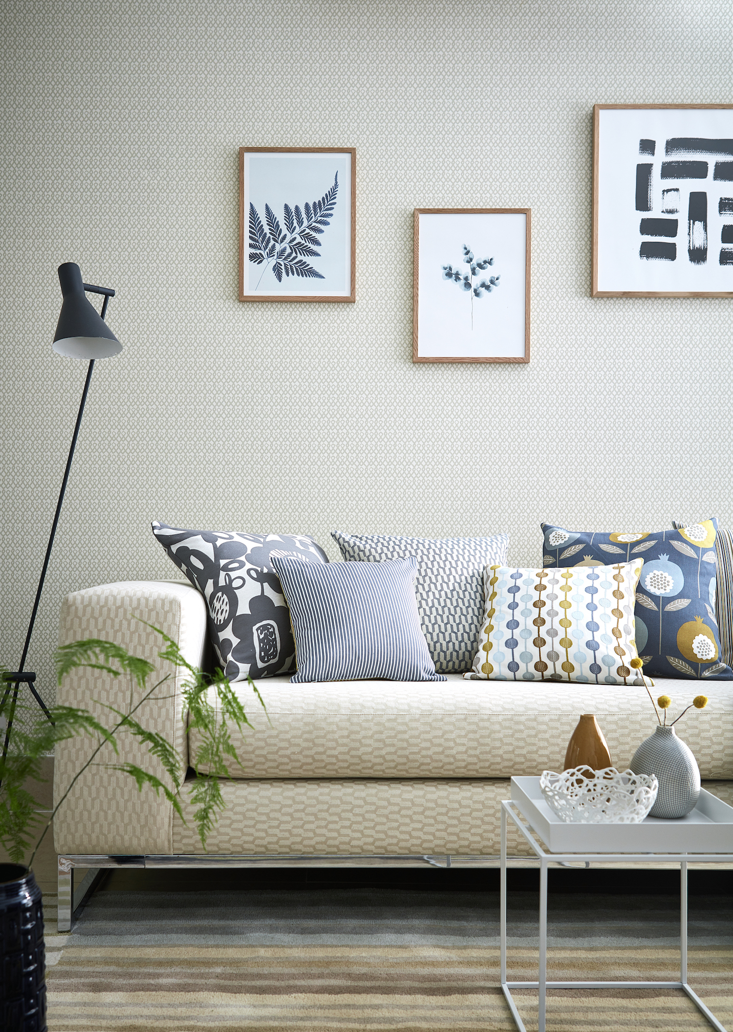 Wallpaper: Ristikko - £39 / roll; Sofa: Metsa - £39 / metre; Cushions: A selection of fabric from Pepino