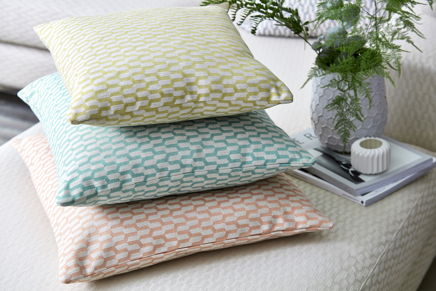 Sofa: Metsa - £39 / metre; Cushions: A selection of fabric from Pepino