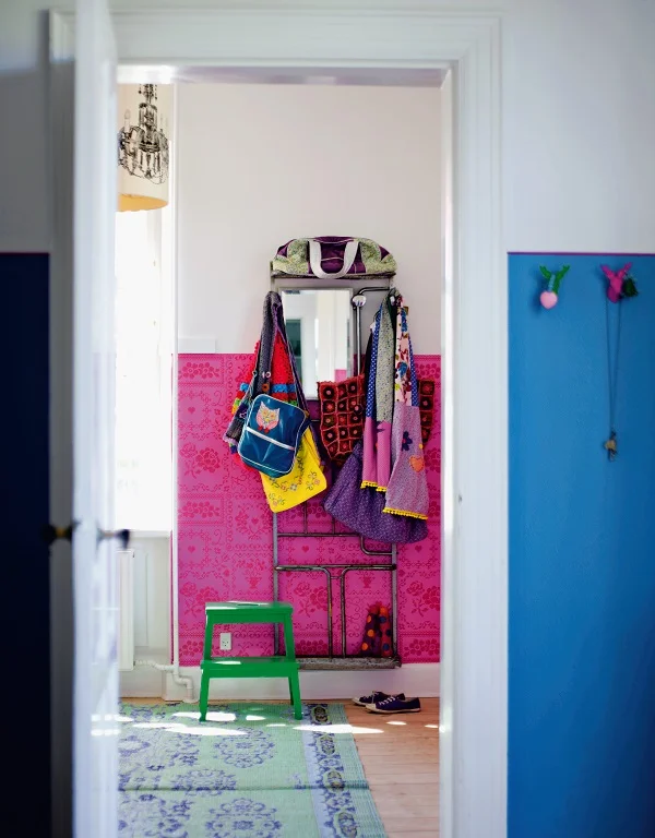 Apply bold colours midway up a wall to lessen their impact but provide a visual feast when moving from one room to another. Use paint or wallpaper to create the colour and add in complementary tones for punctuation.