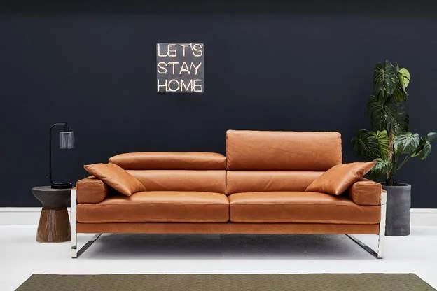 The Rocco sofa range has a chic, modern look with sleek square frame legs and a fabulous cubic design. The clean lines, gorgeous Italian leather and shiny metal legs gives it a stunning contemporary style, whilst the deep seat and manually liftable headrests makes this sofa incredibly comfortable for snuggling down and slouching right into your seat. There is also a recliner option is you want to make it even more relaxing! For a modern sofa that combines geometric stylings with high levels of comfort, the Rocco is ideal.