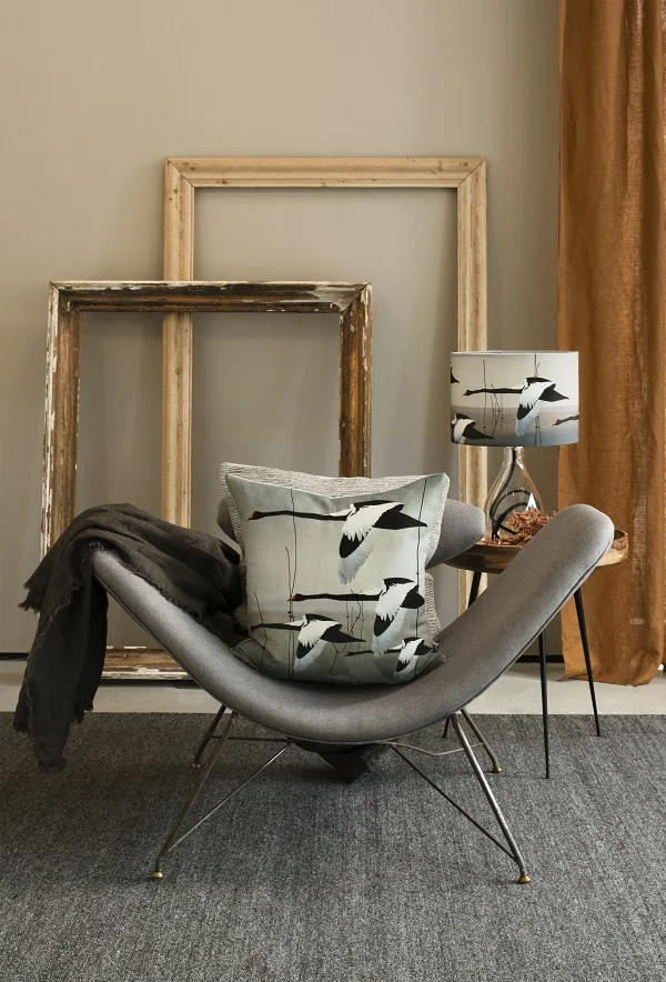 Linen cushion, £65. Medium lamp with black flex, £199.