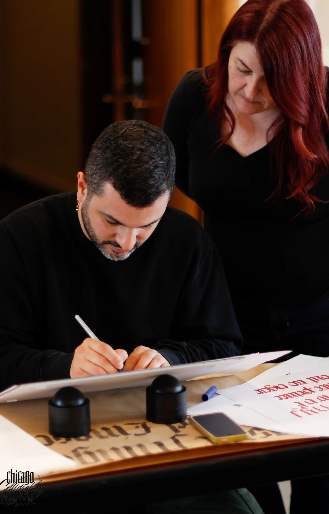 Luca schooling me. Photo © Chicago Calligraphy Collective.