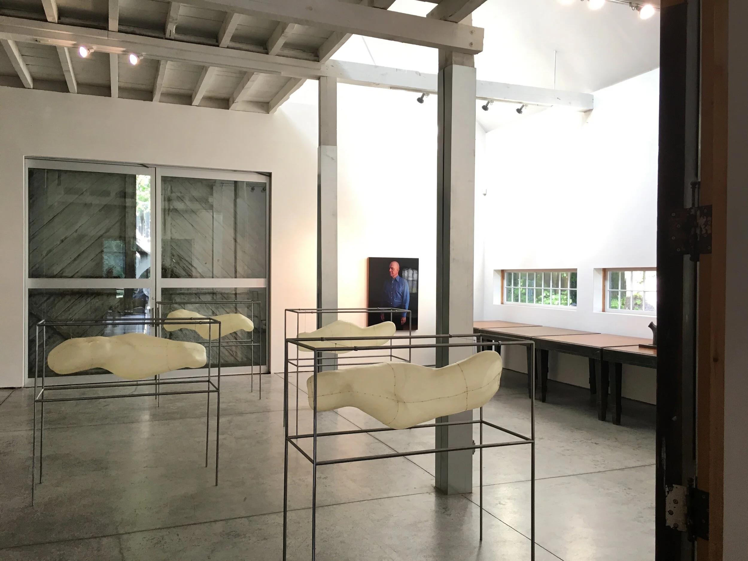 Tom Cowgill sculpture. Philip Brou painting.