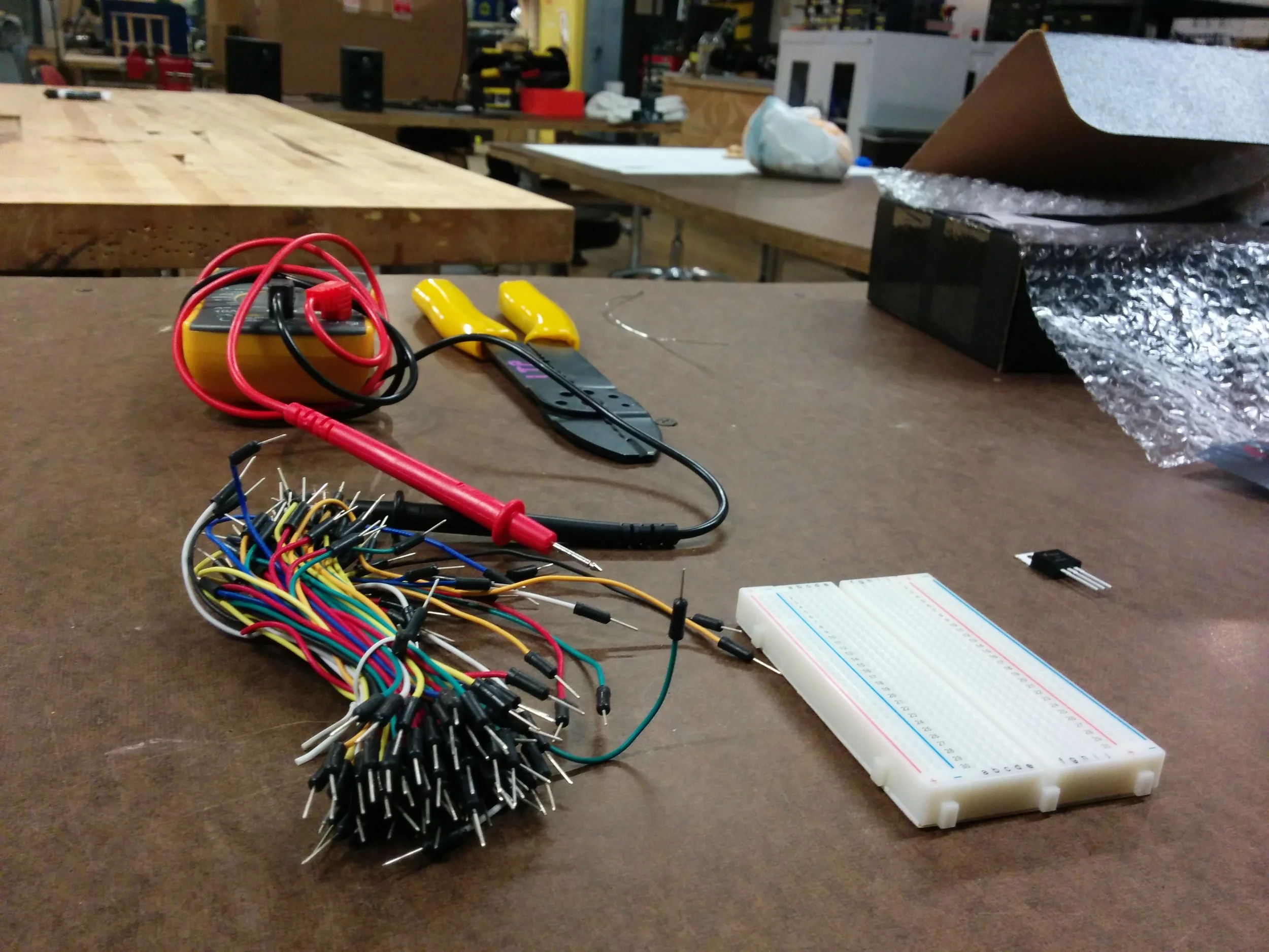 Materials for it - wires, breadboard, wire stripper, multimeter, voltage regulator