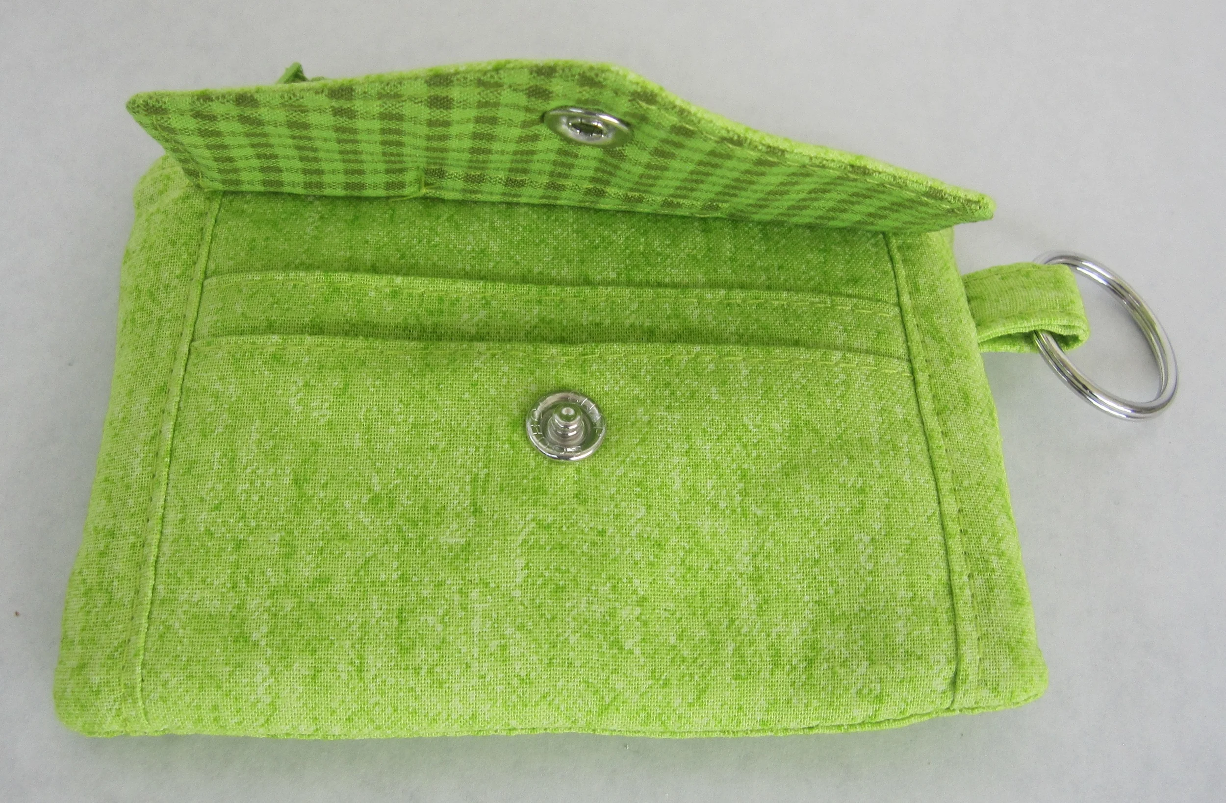 I love how the underside of the envelope flap matches the lining of the zipper pocket in the next picture!