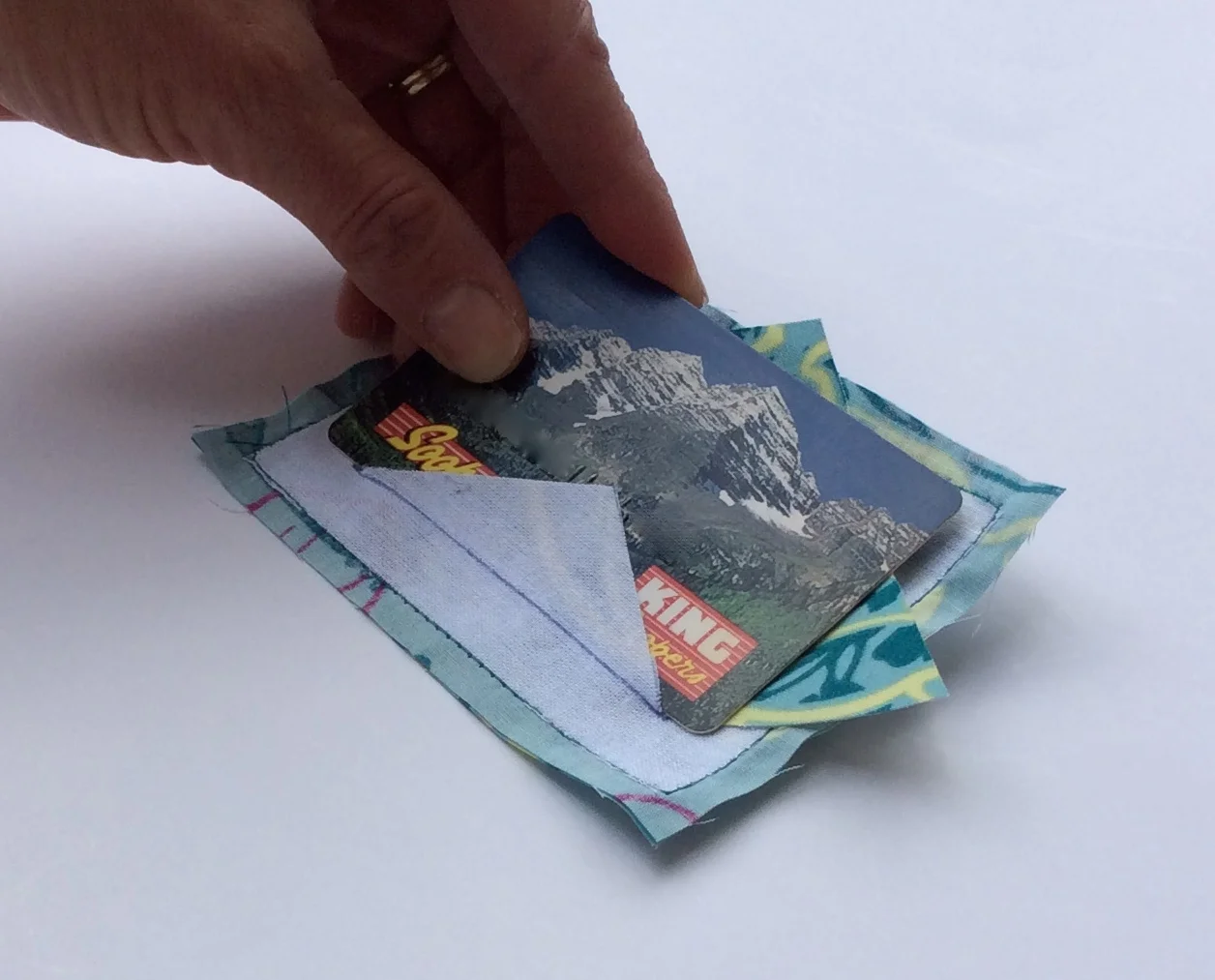 I followed Paula's directions and placed the edge of the card right at the base of the triangle at the fold line.
