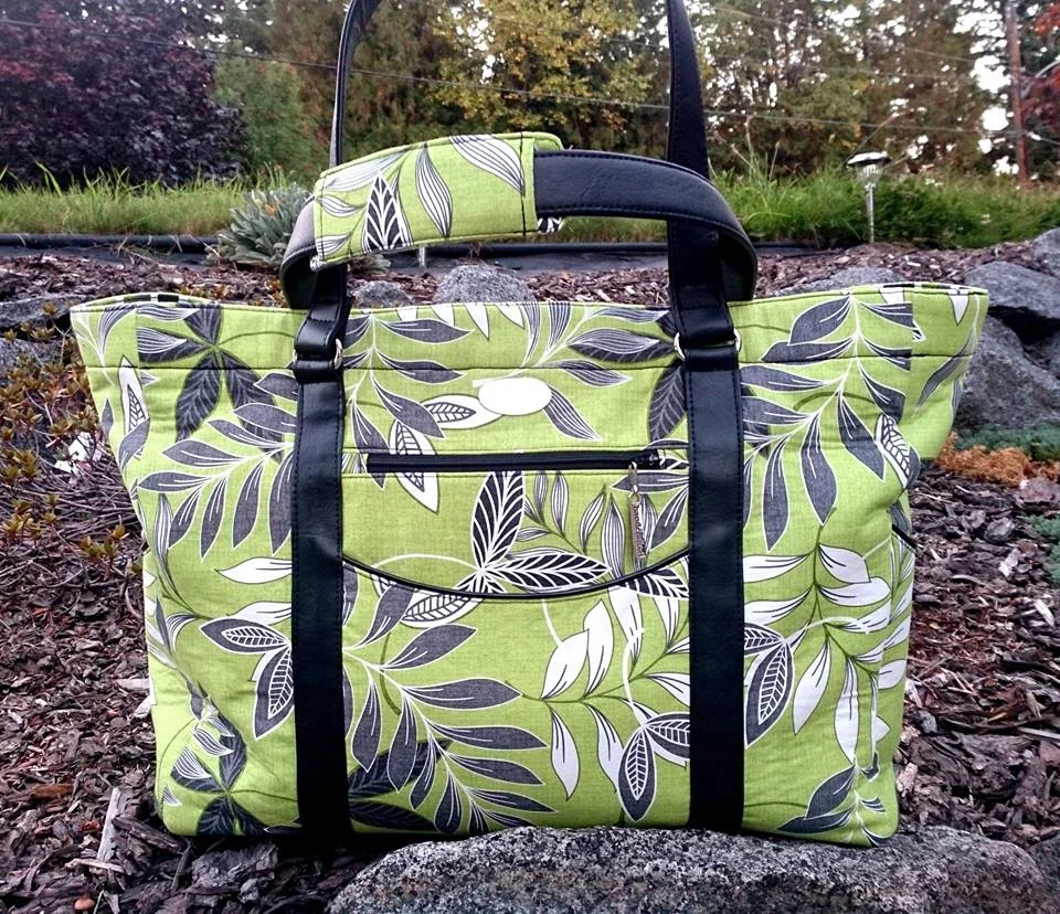 The black faux leather straps really look great with the green leaf print fabric.