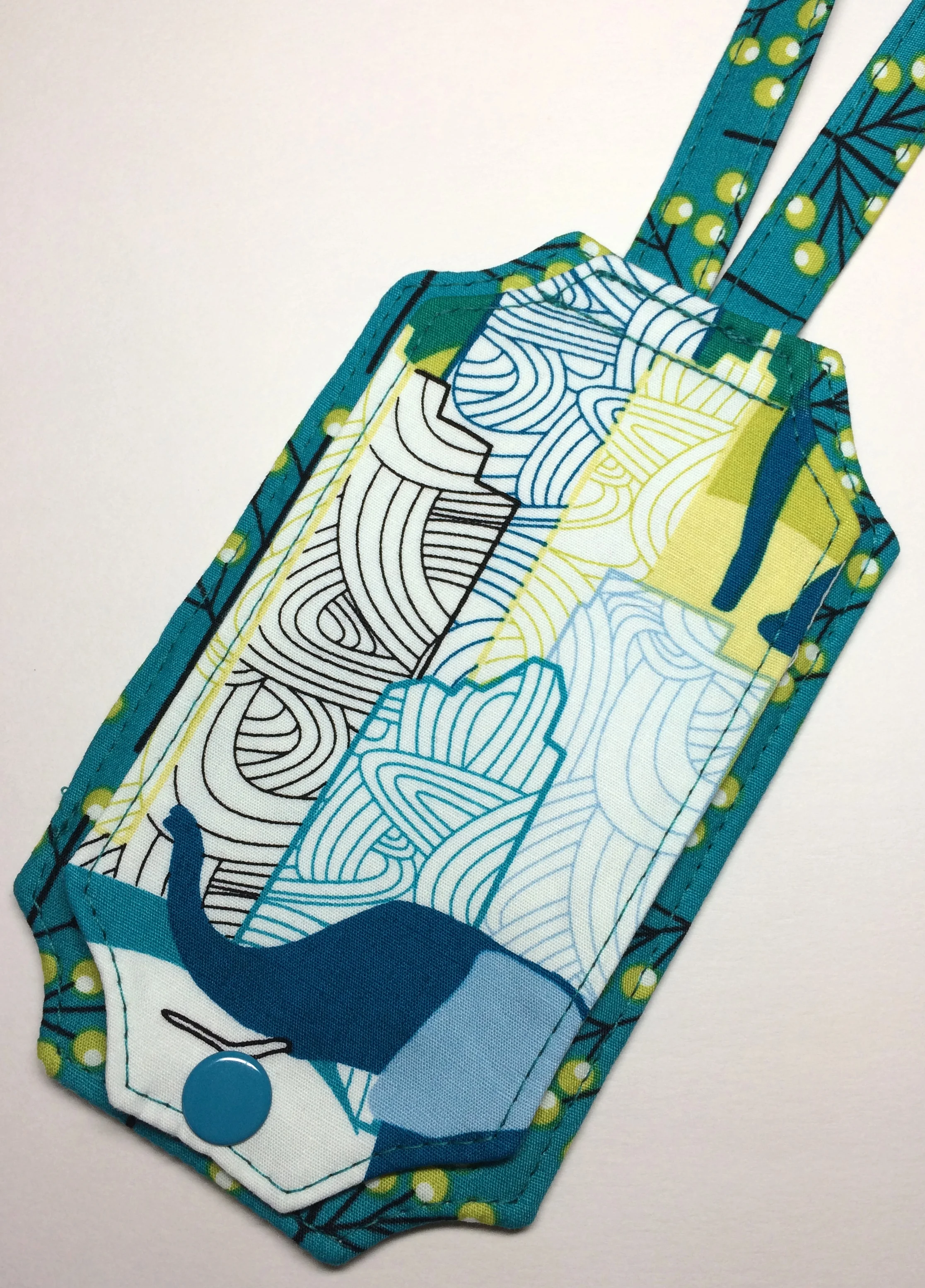 This is a Just the Ticket Luggage Tag that I made. I don't have an embroidery machine, but I wanted to showcase the elephants in this fabric.