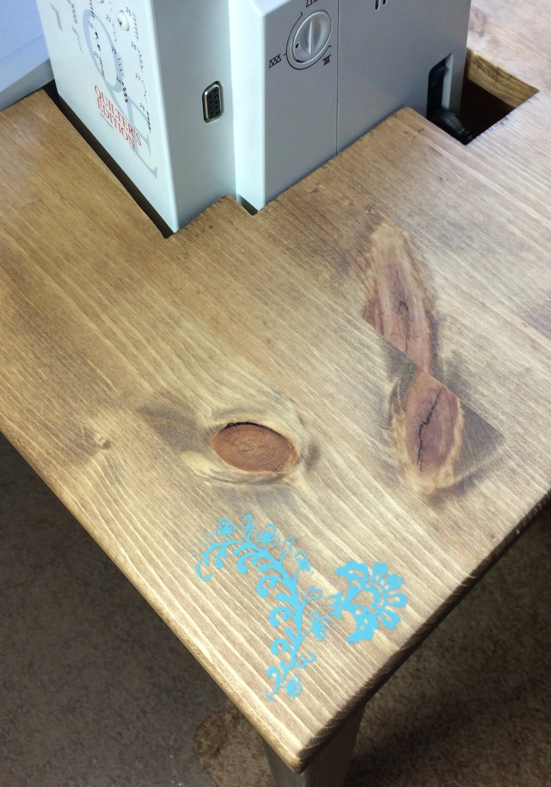 You can see the notch in the upper right part of this picture. (You can also see the stencil detail I added on this corner of the table too.)