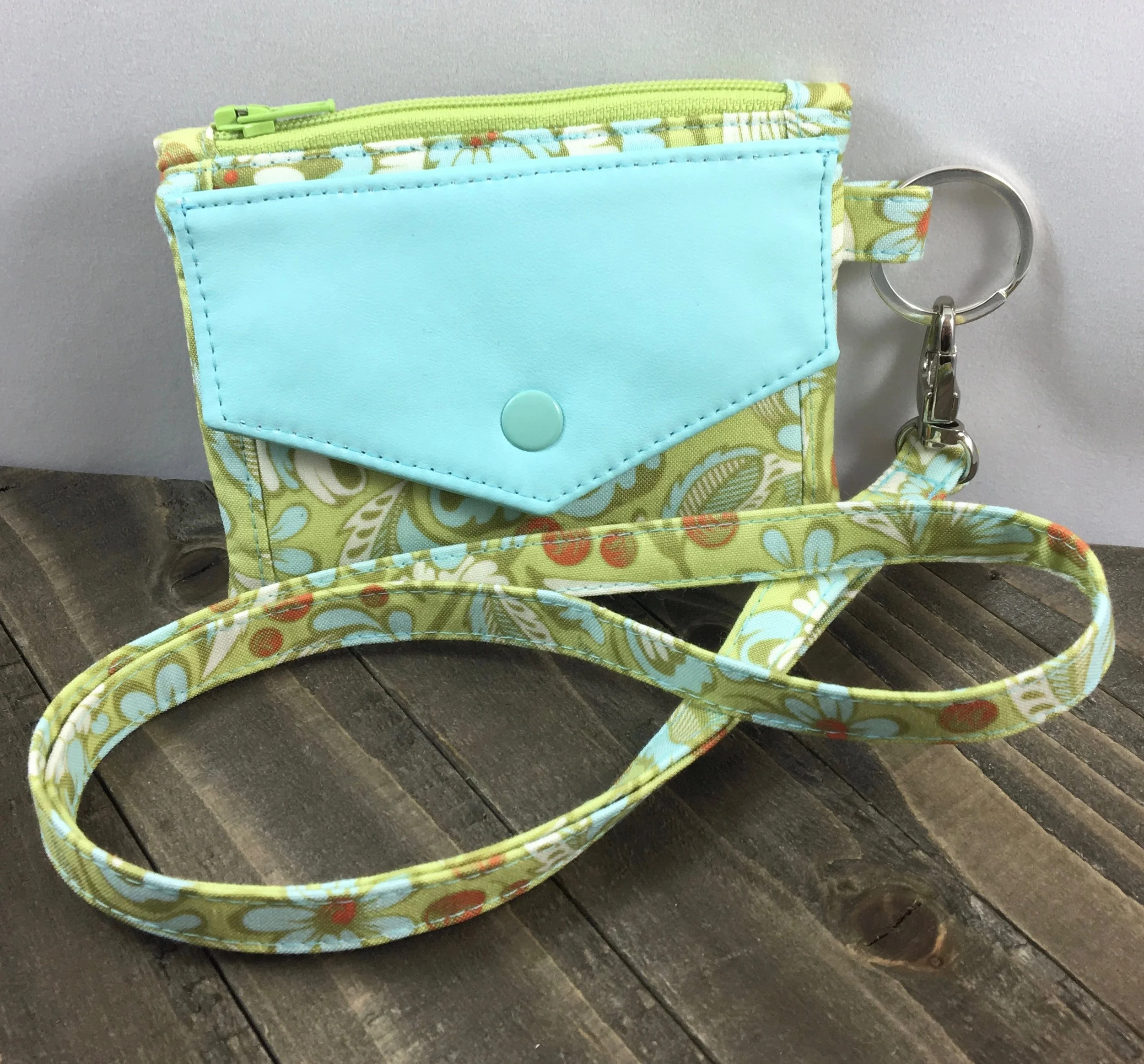 To find out how to make the flap and ID window pocket on the Kristine ID Wallet out of cork or faux leather, check out the Using Cork or Faux Leather As An Accent blog post .
