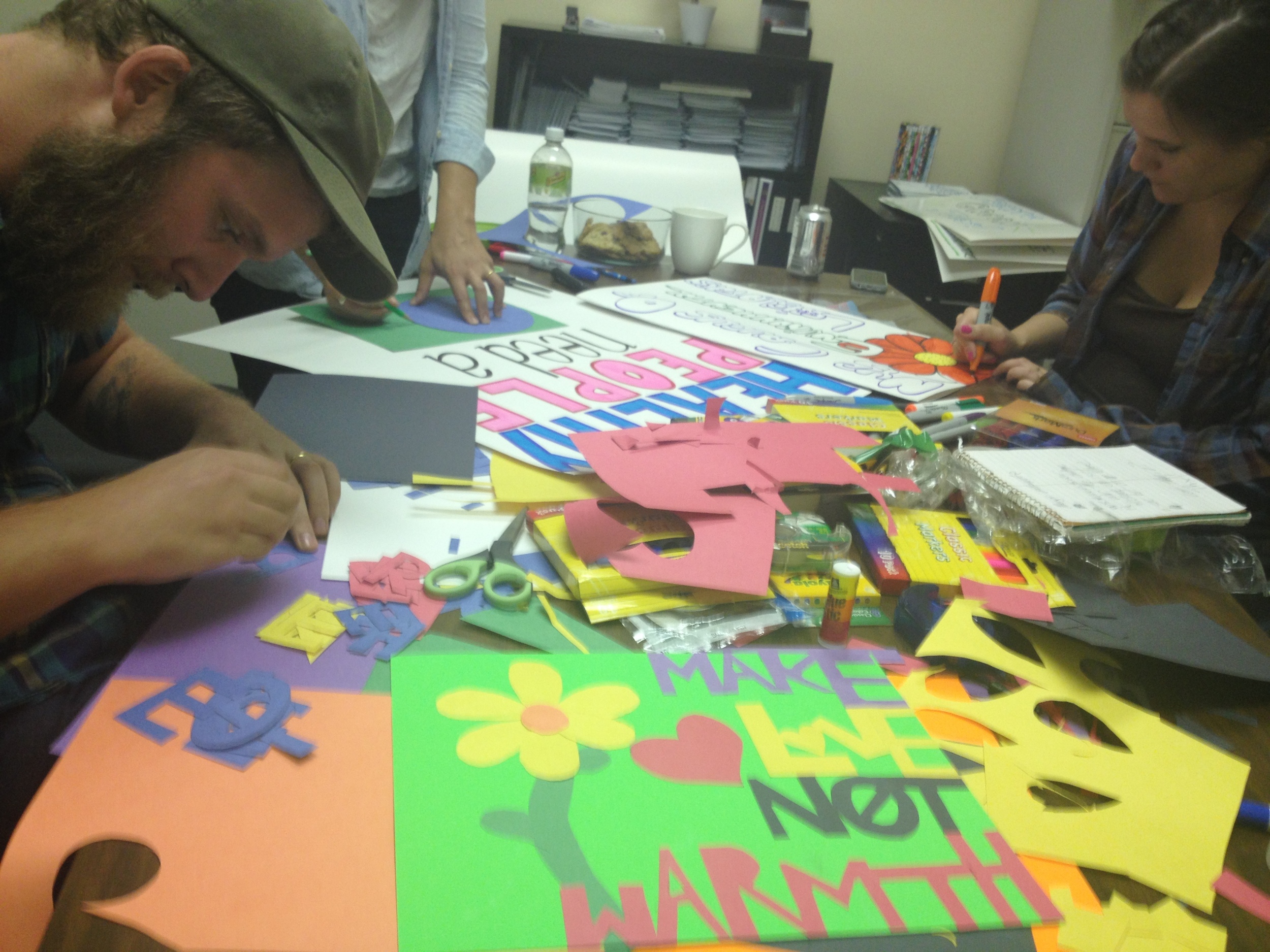 Bewilderers hard at work making signs the day before the event