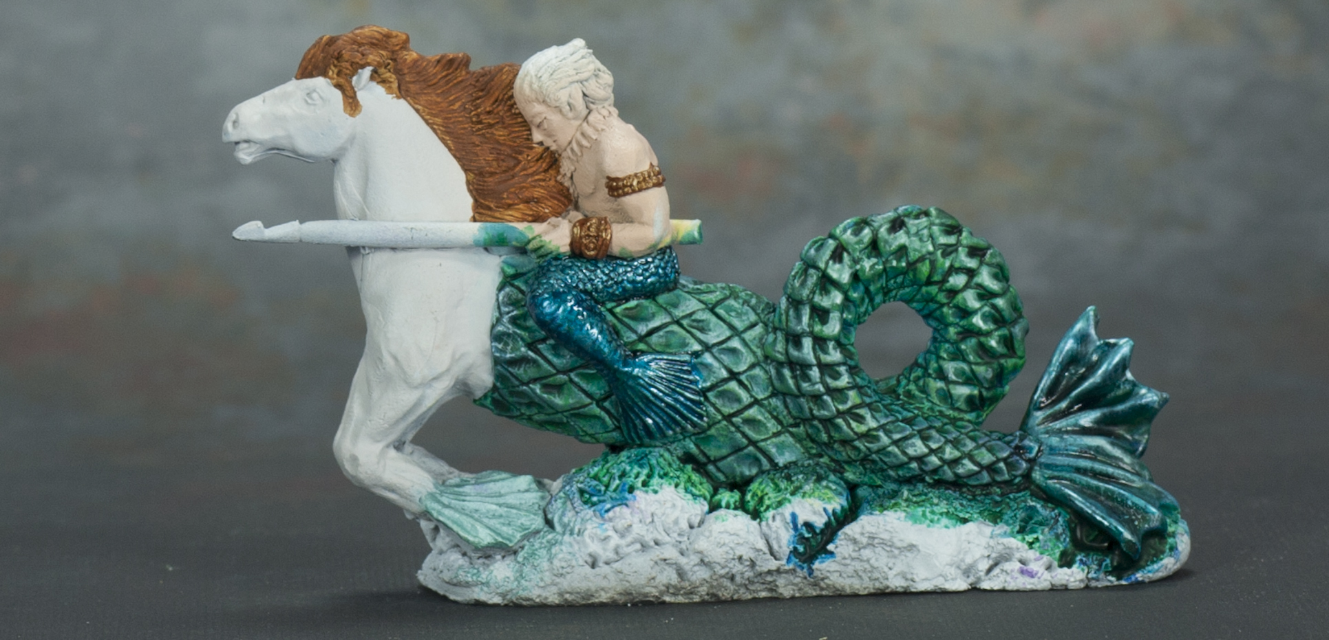 Titan riding a seahorse. Still working on this one but I am starting to like it more.