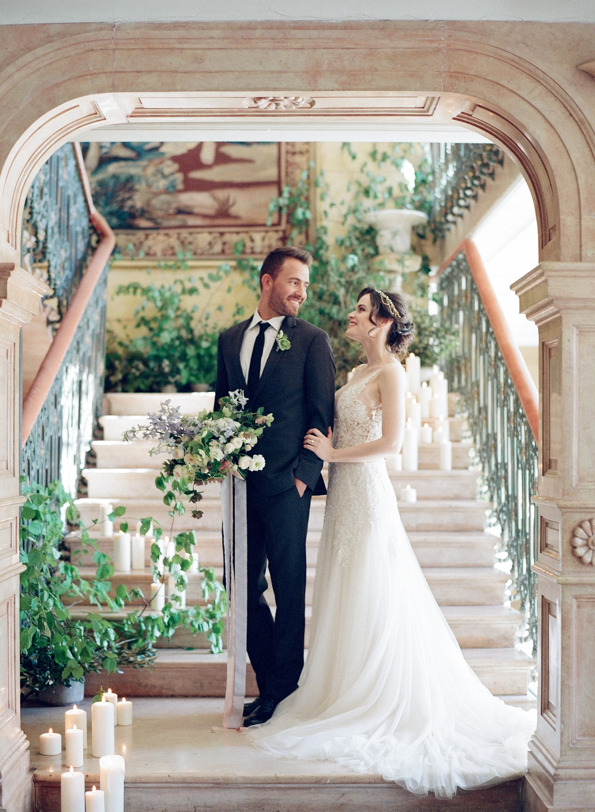 Bride and groom in Chateau de Varennes chapel; Sylvie Gil Photography