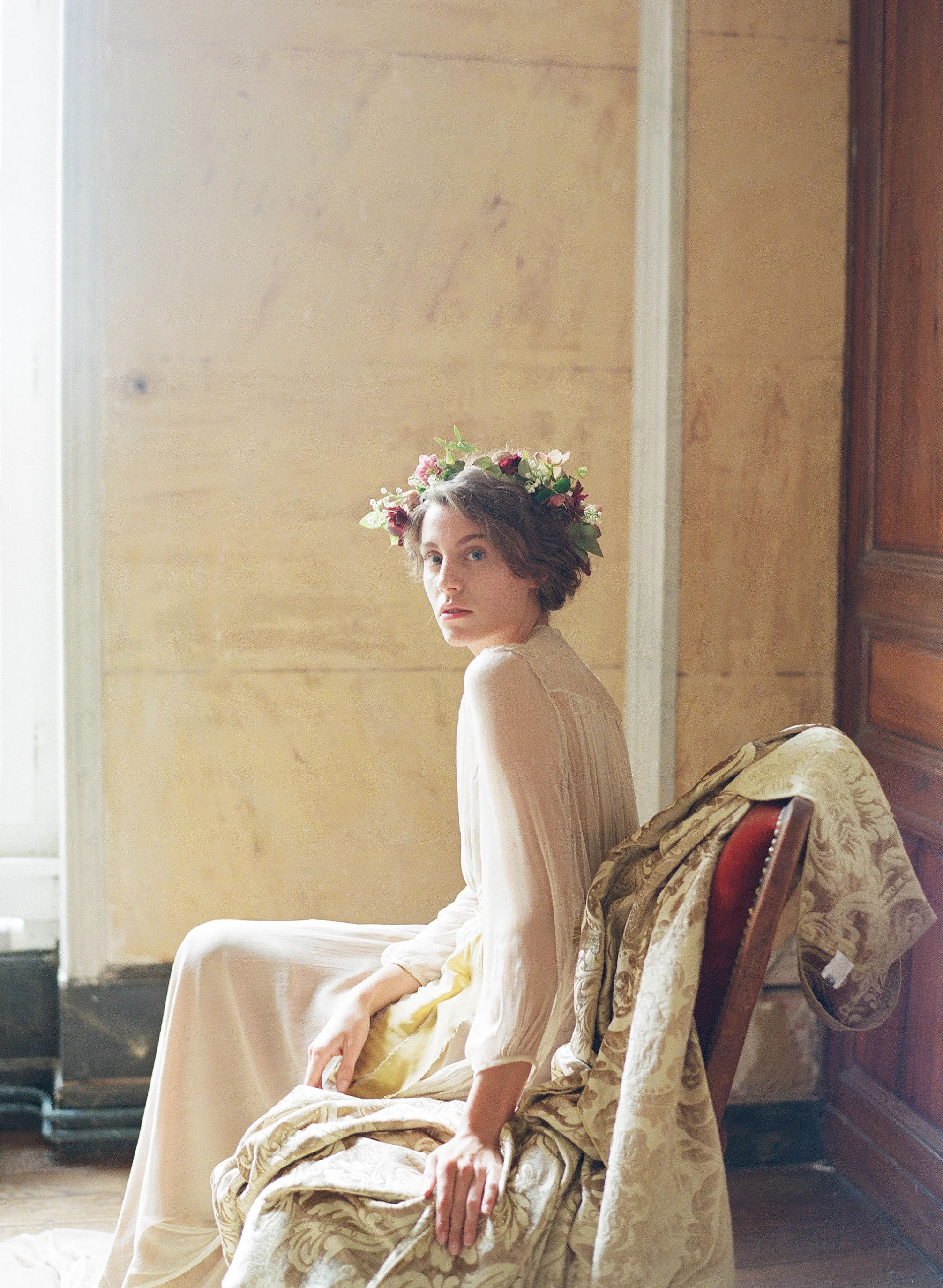 A Renaissance bride poses for a boudoir session in Chateau de Varennes; Sylvie Gil Photography
