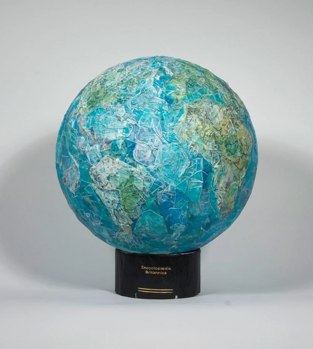 Untitled (Atlas Globe), an artwork by Lorna Stevens made from an Encyclopedia Britannica Atlas altered and shaped into a three-dimensional globe.
