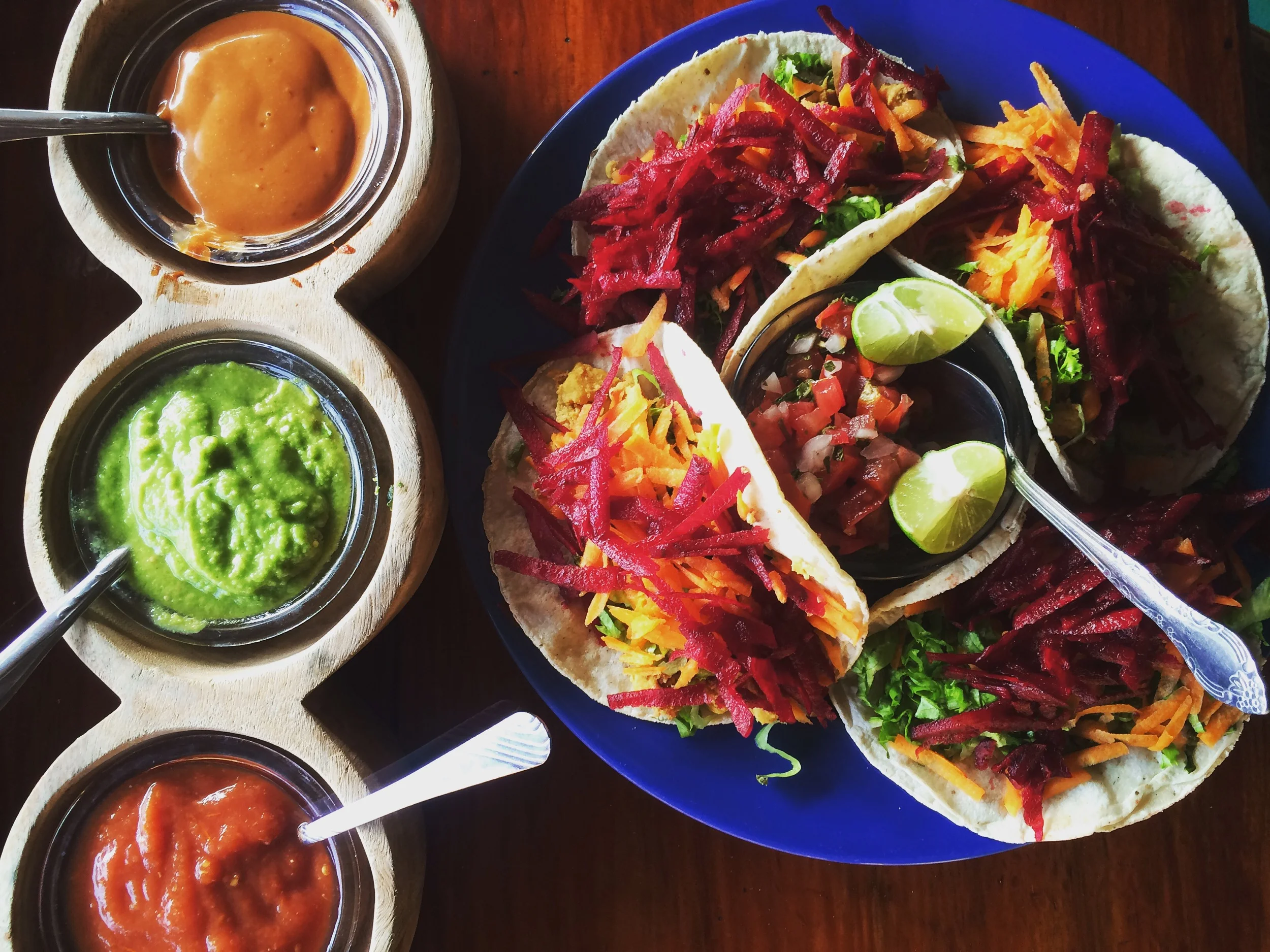 Fresh, yummy tacos from Spirulina. Chicken with shaved beets, carrots, and lettuce on top. 