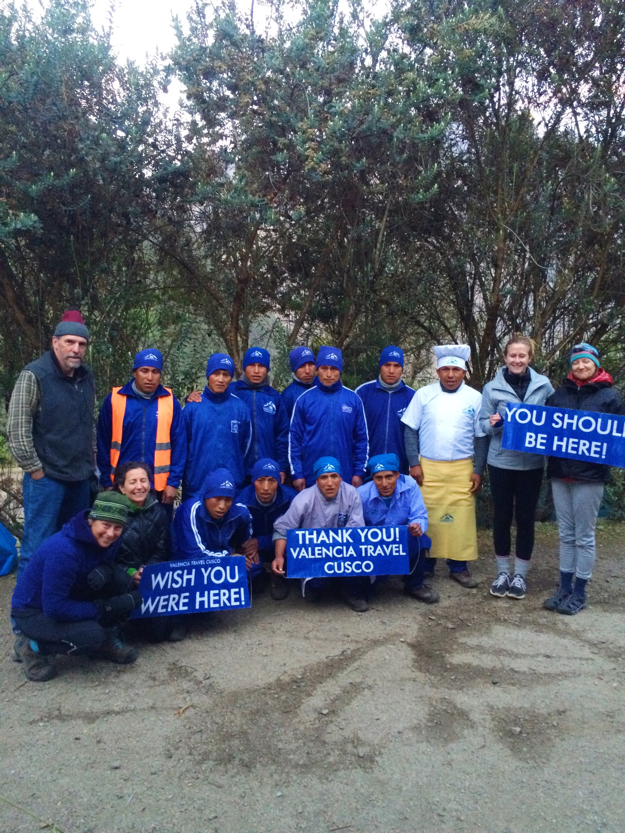Our amazing porters looking like a competitive track team in their matching outfits! Terrible lighting and my eyes are closed here, but you get the idea. 