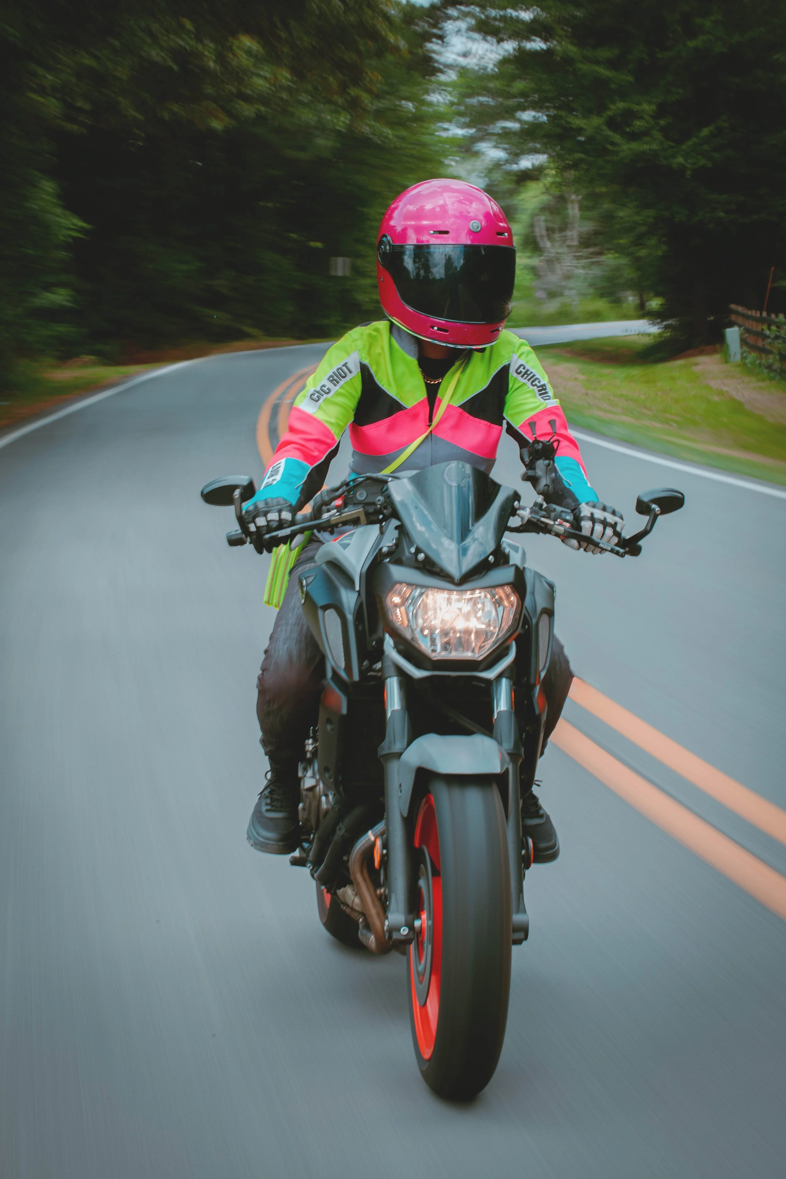 Chic-Riot-Hi-Viz-Kahling-Moto-Jacket-Pink-Torc-Helmet-Rolling-Shoot.jpg
