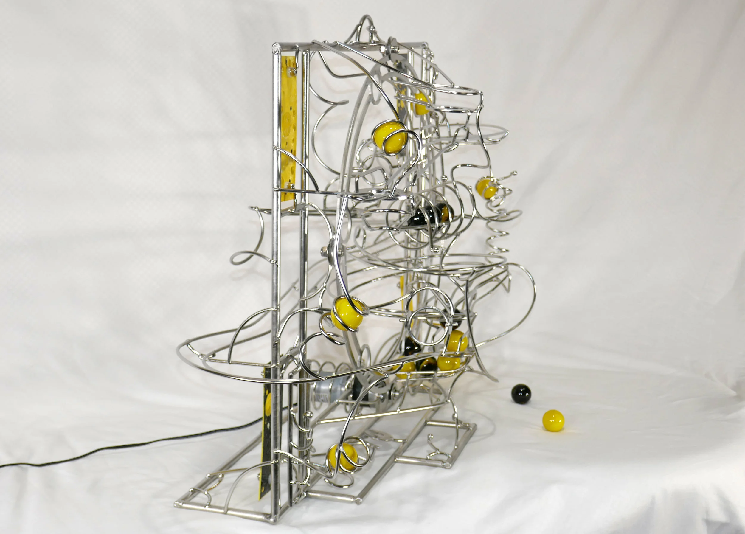 Rolling ball marble machine - side view of kinetic sculpture