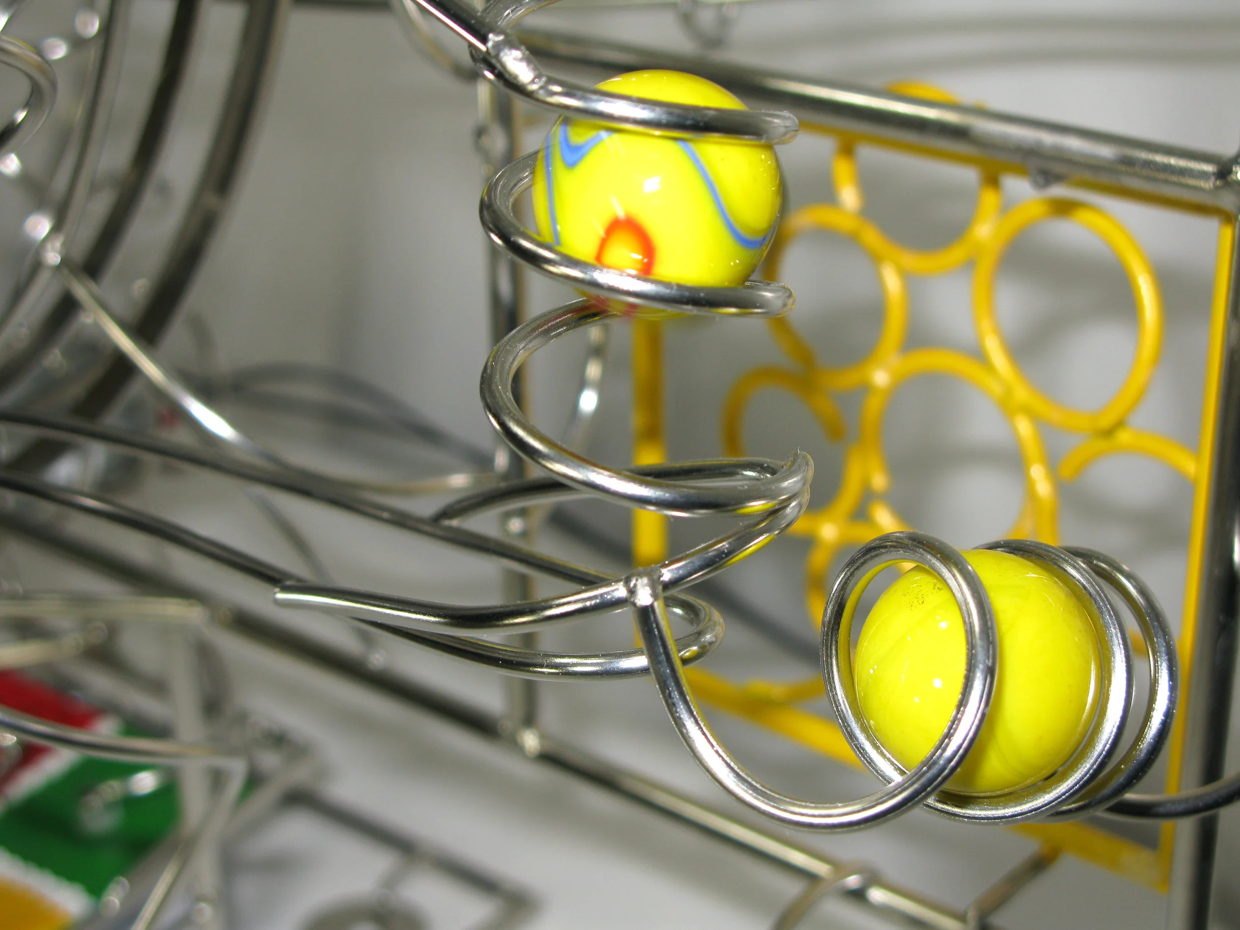 Rolling ball marble Sculpture - yellow corner detail 