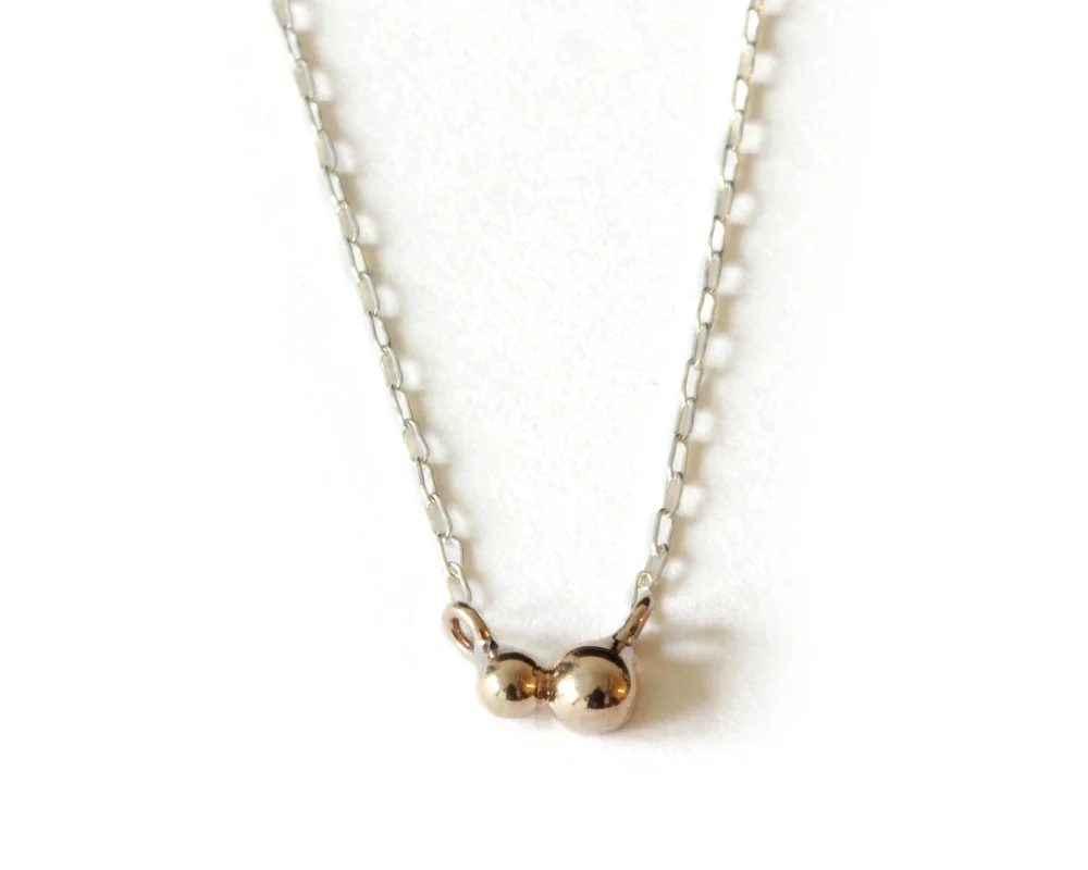 DOUBLE-ORB-NECKLACE.jpg