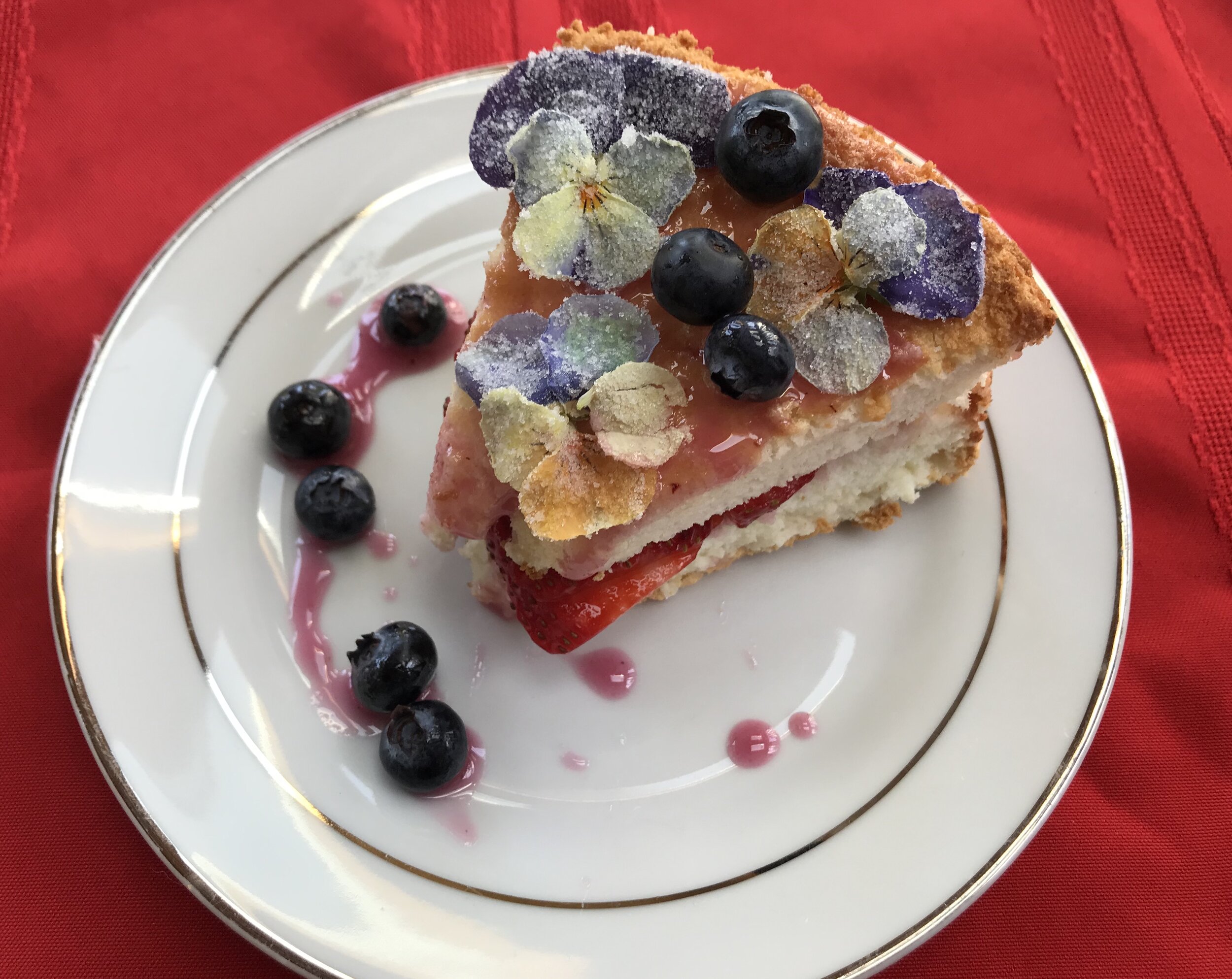 Scratch-made Angel Food Cake with Sauvie Island Strawberries and Blueberries and Candied Violets