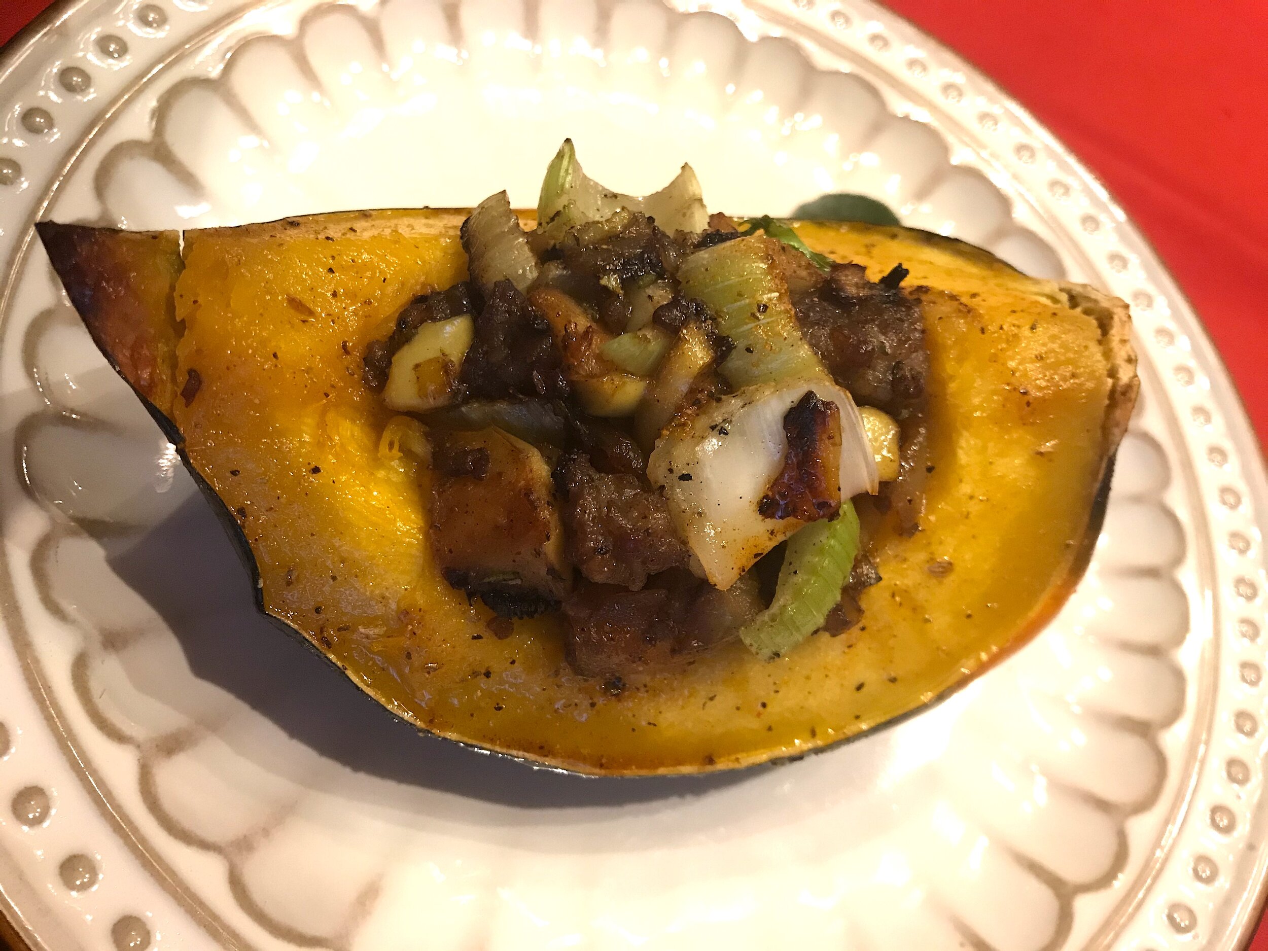 Bratwurst and apple stuffed roasted acorn squash