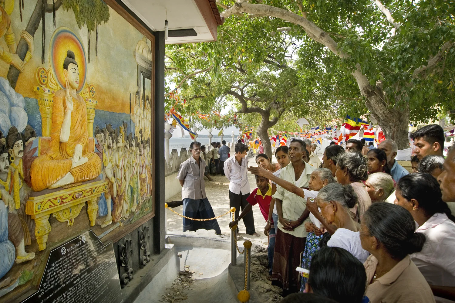 Pilgrims visiting Nagadeepa, an island north of Jaffna in the Palk strait, said to be Buddha's first landing point on the way to Sri Lanka. As the island was off-limits for much of the civil war, many of the older pilgrims are visiting for the first time in 20-30 years.